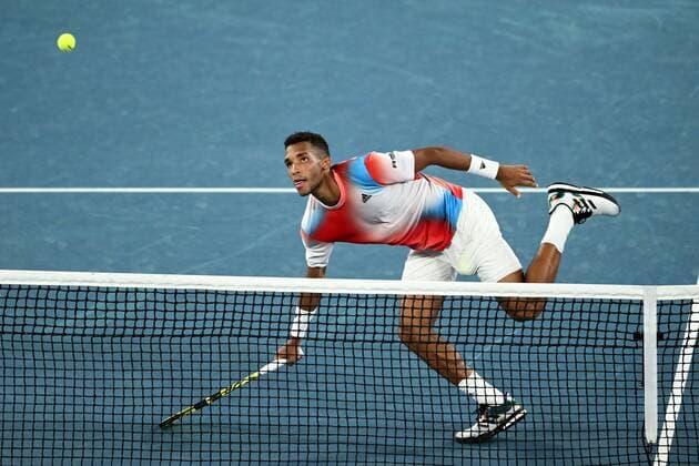 Mandatory Credit: Photo by James Gourley Shutterstock (12773754er) Felix Auger-Aliassime during his quarter final match Australian Open, Day Ten, Tennis, Melbourne Park, Melbourne, Australia - 26 Jan 2022 Australian Open, Day Ten, Tennis, Melbourne Park, Melbourne, Australia - 26 Jan 2022 Copyright: xJamesxGourley Shutterstockx 12773754er