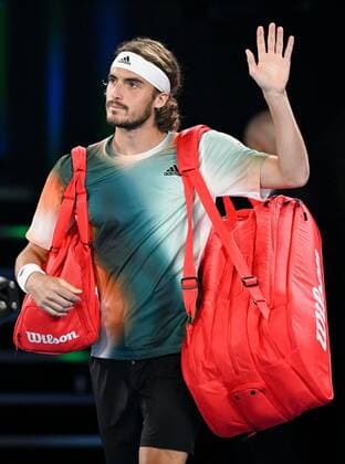 Mandatory Credit: Photo by James Gourley Shutterstock (12775245cx) Stefanos Tsitsipas walks onto court Australian Open, Day Twelve, Tennis, Melbourne Park, Melbourne, Australia - 28 Jan 2022 Australian Open, Day Twelve, Tennis, Melbourne Park, Melbourne, Australia - 28 Jan 2022 Copyright: xJamesxGourley Shutterstockx 12775245cx