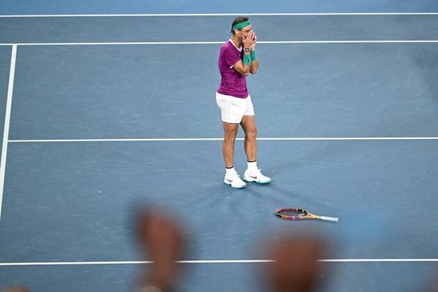 Mandatory Credit: Photo by James Gourley Shutterstock (12778011fo) Rafael Nadal celebrates victory in the Men s Singles final Australian Open, Day Fourteen, Tennis, Melbourne Park, Melbourne, Australia - 30 Jan 2022 Australian Open, Day Fourteen, Tennis, Melbourne Park, Melbourne, Australia - 30 Jan 2022 Copyright: xJamesxGourley Shutterstockx 12778011fo