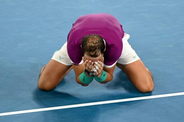 Mandatory Credit: Photo by James Gourley Shutterstock (12778011gd) Rafael Nadal celebrates victory in the Men s Singles final Australian Open, Day Fourteen, Tennis, Melbourne Park, Melbourne, Australia - 30 Jan 2022 Australian Open, Day Fourteen, Tennis, Melbourne Park, Melbourne, Australia - 30 Jan 2022 Copyright: xJamesxGourley Shutterstockx 12778011gd