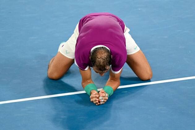 Mandatory Credit: Photo by James Gourley Shutterstock (12778011hh) Rafael Nadal celebrates victory in the Men s Singles final Australian Open, Day Fourteen, Tennis, Melbourne Park, Melbourne, Australia - 30 Jan 2022 Australian Open, Day Fourteen, Tennis, Melbourne Park, Melbourne, Australia - 30 Jan 2022 Copyright: xJamesxGourley Shutterstockx 12778011hh