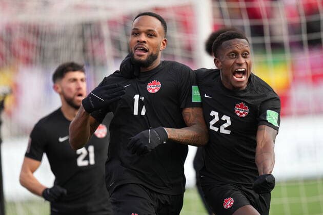 January 30, 2022, Hamilton, ON, CANADA: Canada s Cyle Larin, 17, celebrates his goal against the USA with teammate Richie Laryea, 22, during a men s first half World Cup Qualifier at sold out Tim Hortons Field in Hamilton, Ontario on Sunday Jan. 30, 2022. Canada News - January 30, 2022 - ZUMAc35_ 20220130_zaf_c35_042 Copyright: xNathanxDenettex