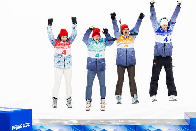 OLYMPICS - Winter Olympic Games, Olympische Spiele, Olympia, OS Beijing 2022 ZHANGJIAKOU,CHINA,07.FEB.22 - OLYMPICS, NORDIC SKIING, Ski jumping, Skispringen, Ski, nordisch - Winter Olympic Games Beijing 2022, normal hill, mixed team event. Image shows the rejoicing of Irma Makhinia, Danil Sadreev, Irina Avvakumova, and Evgeniy Klimov (SLO). GEPAxpictures xPatrickxSteiner