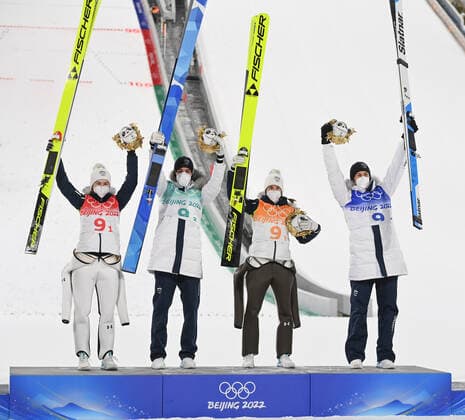 (220207) -- ZHANGJIAKOU, Feb. 7, 2022 -- Gold medalist team of Slovenia celebrate during the flower ceremony after Ski jumping, Skispringen, Ski, nordisch Mixed Team Final Round at the National Ski Jumping Centre in Zhangjiakou, north China s Hebei Province, Feb. 7, 2022. ) (BEIJING2022) CHINA-ZHANGJIAKOU-OLYMPIC Winter games, Winterspiele,Spiele, Summer games SKI JUMPING-MIXED TEAM(CN) JiangxKehong