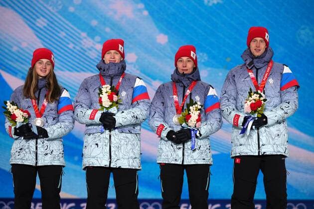 China Olympics 2022 Medal Ceremony 8108189 08.02.2022 Silver medalists Russian Olympic Committee s Irma Makhinia, Danil Sadreev, Irina Avvakumova, Evgeniy Klimov pose on the podium during the medal ceremony for the Ski jumping, Skispringen, Ski, nordisch mixed team event of the Beijing 2022 Winter Olympic Games, Olympische Spiele, Olympia, OS at the Medals Plaza in Zhangjiakou, China. Ramil Sitdikov Sputnik Beijing China Copyright: xRamilxSitdikovx