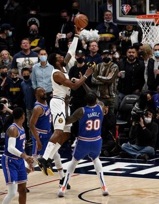 Denver Nuggets forward Jeff Green 32, center right, goes up for a basket against New York Knicks forward Julius Randle 30, right, as New York Knicks guard Kemba Walker 8, center left, and New York Knicks guard RJ Barrett 9, left, look on during the first quarter at the Ball Arena in Denver, CO, USA, 08 February 2022. EPA Todd Pierson Denver Nuggets - New York Knicks !ACHTUNG: NUR REDAKTIONELLE NUTZUNG! Copyright: xToddxPiersonx AME4542 20220209-1bbec4c698db74fdc636ee4b9f26169831516802