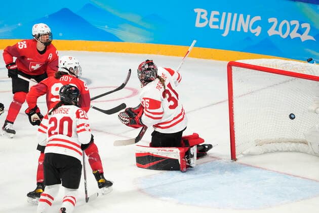 February 14, 2022, Beijing, ON, China: Switzerland forward Lara Stalder, not shown, scores on Canada goaltender Ann-Renee Desbiens during first period women s Ice hockey, Eishockey semifinals action Monday, February 14, 2022 at the 2022 Winter Olympics in Beijing. Canada News - February 14, 2022 - ZUMAc35_ 20220214_zaf_c35_020 Copyright: xRyanxRemiorzx