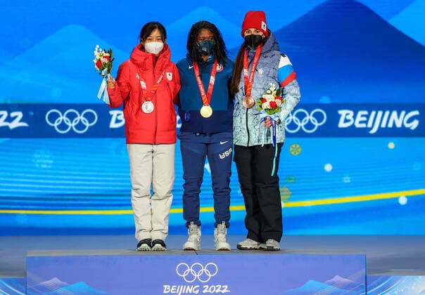BEIJING, CHINA - FEBRUARY 14, 2022: Silver medalist, Miho Takagi of Japan, Gold medalist, Erin Jackson of the USA and Bronze medalist, ROC athlete Angelina Golikova (L-R) attend an award ceremony for the women s 500m Speed skating, Eisschnelllauf event at the 2022 Winter Olympic Games, Olympische Spiele, Olympia, OS at the Medals Plaza. Anton Novoderezhkin TASS TS123148