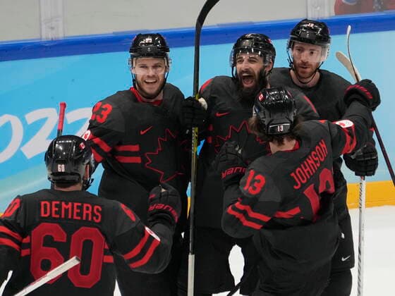 February 15, 2022, Beijing, China: Team Canada players (left to right) Jason Demers (60), Tyler Wotherspoon (23), Eric O Dell (19), Kent Johnson (13) and and Ben Street (10) celebrate O Dell s goal against Team China during second period men s qualification round hockey action at the Beijing Winter Olympics in Beijing, China, on Tuesday, Feb. 15, 2022. Canada News - February 15, 2022 - ZUMAc35_ 20220215_zaf_c35_122 Copyright: xRyanxRemiorzx