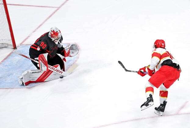 (220215) -- BEIJING, Feb. 15, 2022 -- Fu Jiang (R) of China shoots during the Ice hockey, Eishockey men s qualification play-off of Beijing 2022 Winter Olympics between Canada and China at Wukesong Sports Centre, in Beijing, capital of China, Feb. 15, 2022. ) (BEIJING2022)CHINA-BEIJING-OLYMPIC Winter games, Winterspiele,Spiele, Summer games ICE HOCKEY-MEN S QUALIFICATION PLAY-OFF-CAN VS CHN (CN) LixZiheng