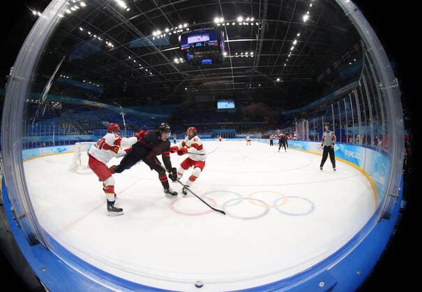 (220215) -- BEIJING, Feb. 15, 2022 -- Owen Power (2nd L) of Canada vies with Wei Ruike (R) and Luo Jia of China during the Ice hockey, Eishockey men s qualification play-off of Beijing 2022 Winter Olympics between Canada and China at Wukesong Sports Centre, in Beijing, capital of China, Feb. 15, 2022. ) (BEIJING2022)CHINA-BEIJING-OLYMPIC Winter games, Winterspiele,Spiele, Summer games ICE HOCKEY-MEN S QUALIFICATION PLAY-OFF-CAN VS CHN (CN) MengxYongmin