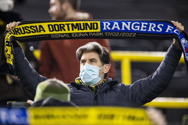 Mandatory Credit: Photo by Kirk O Rourke Rangers FC Shutterstock (12811477bs) A half and half scarf during the Europa League match at the Signal Iduna Park, Dortmund. Borussia Dortmund v Rangers, UEFA Europa League, Round of 32, Westfalenstadion, Dortmund, Germany - 17 Feb 2022 Borussia Dortmund v Rangers, UEFA Europa League, Round of 32, Westfalenstadion, Dortmund, Germany - 17 Feb 2022 Copyright: xKirkxO Rourke RangersxFC Shutterstockx 12811477bs