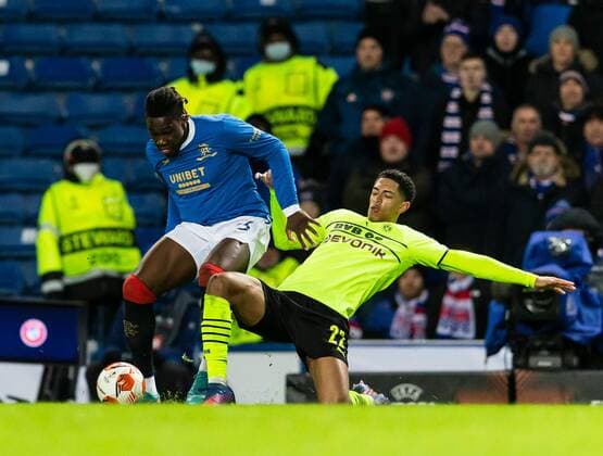 Mandatory Credit: Photo by Luke Nickerson Rangers FC Shutterstock (12821152ad) Rangers Defender Calvin Bassey is tackled by Borussia Dortmund Midfielder Jude Bellingham Rangers v Borussia Dortmund, UEFA Europa League, Play-offs, Second Leg, Football, Ibrox Stadium, Glasgow, UK - 24 Feb 2022 Rangers v Borussia Dortmund, UEFA Europa League, Play-offs, Second Leg, Football, Ibrox Stadium, Glasgow, UK - 24 Feb 2022 Copyright: xLukexNickerson RangersxFC Shutterstockx 12821152ad