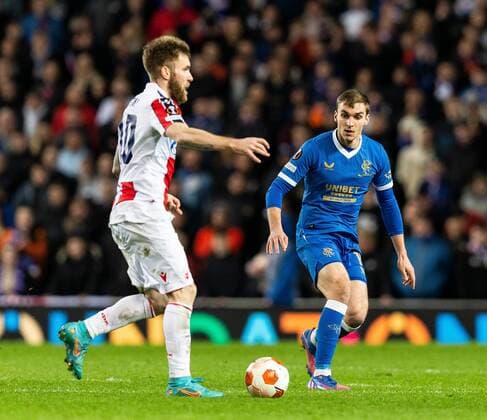 Mandatory Credit: Photo by Luke Nickerson Rangers FC Shutterstock (12843267cf) Rangers Midfielder James Sands closes down Red Star Belgrade Midfielder Aleksandar Kati Rangers v Red Star Belgrade, Europa League, Round of 16, First Leg, Football, Ibrox Stadium, Glasgow, UK - 10 Mar 2022 EDITORIAL USE ONLY No use with unauthorised audio, video, data, fixture lists, club league logos or live services. Online in-match use limited to 120 images, no video emulation. No use in betting, games or single club league player publications. Rangers v Red Star Belgrade, Europa League, Round of 16, First Leg, Football, Ibrox Stadium, Glasgow, UK - 10 Mar 2022 EDITORIAL USE ONLY No use with unauthorised audio, video, data, fixture lists, club league logos or live services. Online in-match use limited to 120 images, no video emulation. No use in betting, games or single club league player publications. Copyright: xLukexNickerson RangersxFC Shutterstockx 12843267cf
