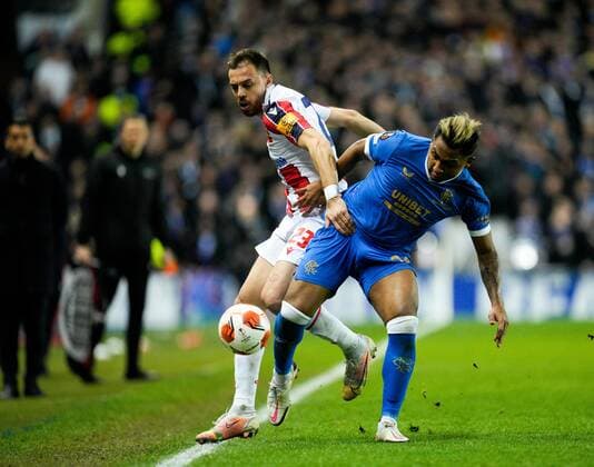 Mandatory Credit: Photo by Stuart Wallace Shutterstock (12843073bh) Alfredo Morelos of Rangers beats Milan Rodic of Crvena Zvezda. Rangers v Red Star Belgrade, Europa League, Round of 16, First Leg, Football, Ibrox Stadium, Glasgow, UK - 10 Mar 2022 EDITORIAL USE ONLY No use with unauthorised audio, video, data, fixture lists, club league logos or live services. Online in-match use limited to 120 images, no video emulation. No use in betting, games or single club league player publications. Rangers v Red Star Belgrade, Europa League, Round of 16, First Leg, Football, Ibrox Stadium, Glasgow, UK - 10 Mar 2022 EDITORIAL USE ONLY No use with unauthorised audio, video, data, fixture lists, club league logos or live services. Online in-match use limited to 120 images, no video emulation. No use in betting, games or single club league player publications. Copyright: xStuartxWallace Shutterstockx 12843073bh