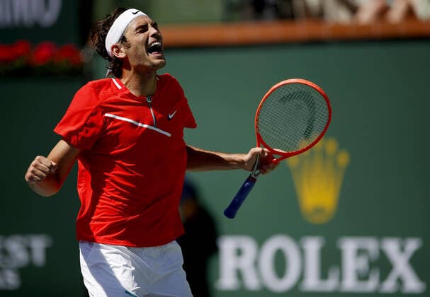Mandatory Credit: Photo by Ella Ling Shutterstock (12845061g) Taylor Fritz of USA celebrates BNP Paribas Open, Tennis, Day 8, Indian Wells Tennis Garden, California, USA - 16 Mar 2022 BNP Paribas Open, Tennis, Day 8, Indian Wells Tennis Garden, California, USA - 16 Mar 2022 Copyright: xEllaxLing Shutterstockx 12845061g