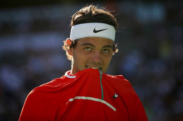 Mandatory Credit: Photo by Ella Ling Shutterstock (12853677bz) Taylor Fritz of USA bites his shirt BNP Paribas Open, Tennis, Day 12, Indian Wells Tennis Garden, California, USA - 20 Mar 2022 BNP Paribas Open, Tennis, Day 12, Indian Wells Tennis Garden, California, USA - 20 Mar 2022 Copyright: xEllaxLing Shutterstockx 12853677bz
