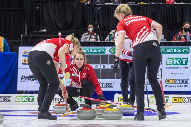 March 22, 2022, Prince George, BC, Canada: Denmark skip Madeleine Dupont watches the stone entering the house as second Denise Dupont, left, and lead My Larsen sweep while Turkey skip Dilsat Yildiz looks on at CN Centre at the Womens World Curling Championship in Prince George, B.C., on Tuesday, March 22, 2022. Canada News - March 22, 2022 - ZUMAc35_ 20220322_zaf_c35_043 Copyright: xJamesxDoylex