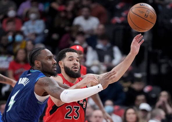 March 30, 2022, TORONTO, ON, CANADA: Toronto Raptors guard Fred VanVleet (23) and Minnesota Timberwolves guard Jaylen Nowell (4) chase a loose ball during first half NBA, Basketball Herren, USA basketball action in Toronto, Wednesday, March 30, 2022. Canada News - March 30, 2022 - ZUMAc35_ 20220330_zaf_c35_139 Copyright: xNathanxDenettex