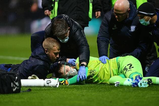 Mandatory Credit: Photo by Phil Oldham Shutterstock (12882005e) Blackpool s Daniel Grimshaw lies injured Preston North End v Blackpool, EFL Sky Bet Championship, Football, Deepdale, Preston, UK - 05 Apr 2022 EDITORIAL USE ONLY No use with unauthorised audio, video, data, fixture lists, club league logos or live services. Online in-match use limited to 120 images, no video emulation. No use in betting, games or single club league player publications. Preston North End v Blackpool, EFL Sky Bet Championship, Football, Deepdale, Preston, UK - 05 Apr 2022 EDITORIAL USE ONLY No use with unauthorised audio, video, data, fixture lists, club league logos or live services. Online in-match use limited to 120 images, no video emulation. No use in betting, games or single club league player publications. Copyright: xPhilxOldham Shutterstockx 12882005e