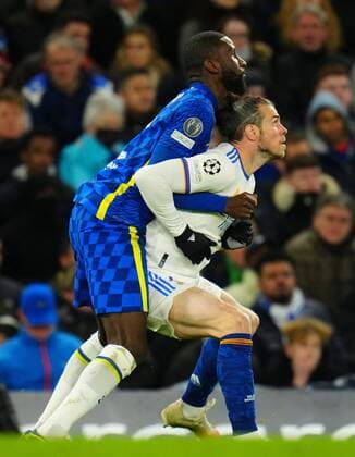Mandatory Credit: Photo by Javier Garcia Shutterstock (12883334v) Antonio Rudiger of Chelsea grapples with Gareth Bale of Real Madrid Chelsea v Real Madrid, UEFA Champions League, Quarter Final, First Leg, Football, Stamford Bridge, London, UK - 06 Apr 2022 EDITORIAL USE ONLY No use with unauthorised audio, video, data, fixture lists, club league logos or live services. Online in-match use limited to 120 images, no video emulation. No use in betting, games or single club league player publications. Chelsea v Real Madrid, UEFA Champions League, Quarter Final, First Leg, Football, Stamford Bridge, London, UK - 06 Apr 2022 EDITORIAL USE ONLY No use with unauthorised audio, video, data, fixture lists, club league logos or live services. Online in-match use limited to 120 images, no video emulation. No use in betting, games or single club league player publications. Copyright: xJavierxGarcia Shutterstockx 12883334v
