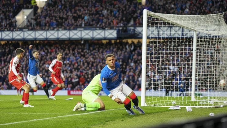 Mandatory Credit: Photo by Stuart Wallace Shutterstock (12893325y) Rangers Captain James Tavernier shoots past SC Braga goalkeeper Matheus to score and give Rangers a 1-0 lead (agg. 1-1). Rangers v Braga, UEFA Europa League, Quarter Final, Second Leg, Football, Ibrox Stadium, Glasgow, UK - 14 Apr 2022 EDITORIAL USE ONLY No use with unauthorised audio, video, data, fixture lists, club league logos or live services. Online in-match use limited to 120 images, no video emulation. No use in betting, games or single club league player publications. Rangers v Braga, UEFA Europa League, Quarter Final, Second Leg, Football, Ibrox Stadium, Glasgow, UK - 14 Apr 2022 EDITORIAL USE ONLY No use with unauthorised audio, video, data, fixture lists, club league logos or live services. Online in-match use limited to 120 images, no video emulation. No use in betting, games or single club league player publications. Copyright: xStuartxWallace Shutterstockx 12893325y