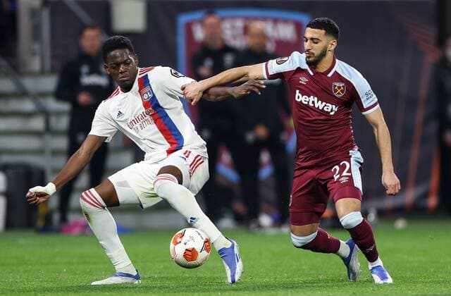 Mandatory Credit: Photo by Simon Dael Shutterstock (12893327ey) Castello Lukeba of Lyon and Said Benrahma of West Ham United Olympique Lyonnais v West Ham United, UEFA Europa League, Quarter Final, Second Leg, Football, Groupama Stadium, Lyon, France - 14 Apr 2022 EDITORIAL USE ONLY No use with unauthorised audio, video, data, fixture lists, club league logos or live services. Online in-match use limited to 120 images, no video emulation. No use in betting, games or single club league player publications. Olympique Lyonnais v West Ham United, UEFA Europa League, Quarter Final, Second Leg, Football, Groupama Stadium, Lyon, France - 14 Apr 2022 EDITORIAL USE ONLY No use with unauthorised audio, video, data, fixture lists, club league logos or live services. Online in-match use limited to 120 images, no video emulation. No use in betting, games or single club league player publications. Copyright: xSimonxDael Shutterstockx 12893327ey