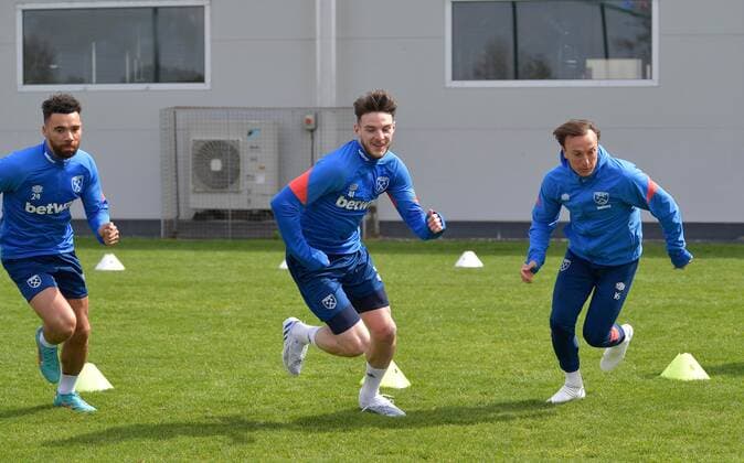 Mandatory Credit: Photo by Arfa Griffiths West Ham United Shutterstock (12905430j) Ryan Fredericks,Declan Rice and Mark Noble of West Ham United during training West Ham United First Team Training, Rush Green Training Ground, London, UK - 22 Apr 2022 EDITORIAL USE ONLY No use with unauthorised audio, video, data, fixture lists, club league logos or live services. Online in-match use limited to 120 images, no video emulation. No use in betting, games or single club league player publications. West Ham United First Team Training, Rush Green Training Ground, London, UK - 22 Apr 2022 EDITORIAL USE ONLY No use with unauthorised audio, video, data, fixture lists, club league logos or live services. Online in-match use limited to 120 images, no video emulation. No use in betting, games or single club league player publications. Copyright: xArfaxGriffiths WestxHamxUnited Shutterstockx 12905430j