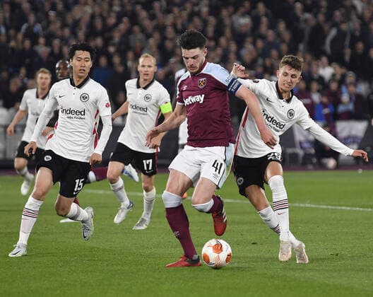 Mandatory Credit: Photo by James Griffiths West Ham United Shutterstock (12914199at) Declan Rice of West Ham United in action with Jesper Lindstrom of Eintracht Frankfurt West Ham United v Eintracht Frankfurt, UEFA Europa League, Semi-Final, First Leg, Football, The London Stadium, London, UK - 28 Apr 2022 EDITORIAL USE ONLY No use with unauthorised audio, video, data, fixture lists, club league logos or live services. Online in-match use limited to 120 images, no video emulation. No use in betting, games or single club league player publications. West Ham United v Eintracht Frankfurt, UEFA Europa League, Semi-Final, First Leg, Football, The London Stadium, London, UK - 28 Apr 2022 EDITORIAL USE ONLY No use with unauthorised audio, video, data, fixture lists, club league logos or live services. Online in-match use limited to 120 images, no video emulation. No use in betting, games or single club league player publications. Copyright: xJamesxGriffiths WestxHamxUnited Shutterstockx 12914199at