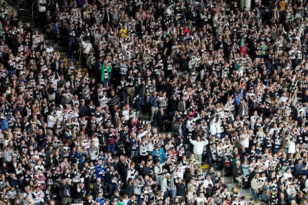 Mandatory Credit: Photo by Dave Shopland Shutterstock (12917138az) Fulham fans celebrate their fourth goal against Luton which came from Mitrovic 4-0 Fulham v Luton Town, EFL Sky Bet Championship, Football, Craven Cottage, London, UK - 02 May 2022 EDITORIAL USE ONLY No use with unauthorised audio, video, data, fixture lists, club league logos or live services. Online in-match use limited to 120 images, no video emulation. No use in betting, games or single club league player publications. Fulham v Luton Town, EFL Sky Bet Championship, Football, Craven Cottage, London, UK - 02 May 2022 EDITORIAL USE ONLY No use with unauthorised audio, video, data, fixture lists, club league logos or live services. Online in-match use limited to 120 images, no video emulation. No use in betting, games or single club league player publications. Copyright: xDavexShopland Shutterstockx 12917138az
