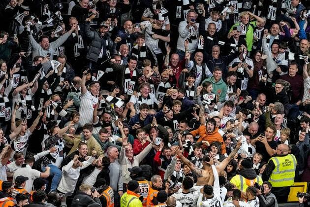 Mandatory Credit: Photo by Dave Shopland Shutterstock (12917138bp) Aleksander Mitrovic of Fulham celebrates their seventh goal against Luton with the fans 7-0 Fulham v Luton Town, EFL Sky Bet Championship, Football, Craven Cottage, London, UK - 02 May 2022 EDITORIAL USE ONLY No use with unauthorised audio, video, data, fixture lists, club league logos or live services. Online in-match use limited to 120 images, no video emulation. No use in betting, games or single club league player publications. Fulham v Luton Town, EFL Sky Bet Championship, Football, Craven Cottage, London, UK - 02 May 2022 EDITORIAL USE ONLY No use with unauthorised audio, video, data, fixture lists, club league logos or live services. Online in-match use limited to 120 images, no video emulation. No use in betting, games or single club league player publications. Copyright: xDavexShopland Shutterstockx 12917138bp