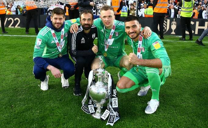 Mandatory Credit: Photo by Kieran McManus Shutterstock (12917139co) Goalkeeper Fabricio Agosto Ramirez of Fulham, Marek Rodak of Fulham and Paulo Gazzaniga of Fulham celebrates with the trophy Fulham v Luton Town, EFL Sky Bet Championship, Football, Craven Cottage, London, UK - 02 May 2022 EDITORIAL USE ONLY No use with unauthorised audio, video, data, fixture lists, club league logos or live services. Online in-match use limited to 120 images, no video emulation. No use in betting, games or single club league player publications. Fulham v Luton Town, EFL Sky Bet Championship, Football, Craven Cottage, London, UK - 02 May 2022 EDITORIAL USE ONLY No use with unauthorised audio, video, data, fixture lists, club league logos or live services. Online in-match use limited to 120 images, no video emulation. No use in betting, games or single club league player publications. Copyright: xKieranxMcManus Shutterstockx 12917139co