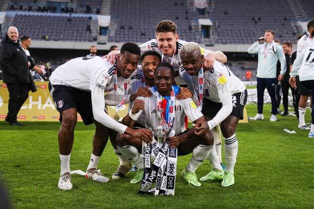 Mandatory Credit: Photo by Will Cooper JMP Shutterstock (12921095en) Fulham players celebrate with the Championship trophy Fulham v Luton Town, UK - 02 May 2022 EDITORIAL USE ONLY No use with unauthorised audio, video, data, fixture lists (outside the EU), club league logos or live services. Online in-match use limited to 45 images (+15 in extra time). No use to emulate moving images. No use in betting, games or single club league player publications services. Fulham v Luton Town, UK - 02 May 2022 EDITORIAL USE ONLY No use with unauthorised audio, video, data, fixture lists (outside the EU), club league logos or live services. Online in-match use limited to 45 images (+15 in extra time). No use to emulate moving images. No use in betting, games or Copyright: xWillxCooper JMP Shutterstockx 12921095en