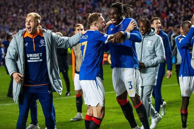 Mandatory Credit: Photo by Kirk O Rourke Rangers FC Shutterstock (12926021cv) Robby McCrorie, Scott Arfield & Calvin Bassey celebrate at the end of the Europa League Semi Final match against RB Leipzig at Ibrox Stadium, Glasgow. Rangers v RB Leipzig, UEFA Europa League, Semi Final, Second Leg, Football, Ibrox Stadium, Glasgow, UK - 05 May 2022 EDITORIAL USE ONLY No use with unauthorised audio, video, data, fixture lists, club league logos or live services. Online in-match use limited to 120 images, no video emulation. No use in betting, games or single club league player publications. Rangers v RB Leipzig, UEFA Europa League, Semi Final, Second Leg, Football, Ibrox Stadium, Glasgow, UK - 05 May 2022 EDITORIAL USE ONLY No use with unauthorised audio, video, data, fixture lists, club league logos or live services. Online in-match use limited to 120 images, no video emulation. No use in betting, games or single club league player publications. Copyright: xKirkxO Rourke RangersxFC Shutterstockx 12926021cv