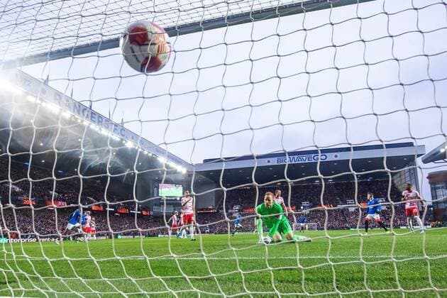 Mandatory Credit: Photo by Kirk O Rourke Rangers FC Shutterstock (12926021fn) Glen Kamara of Rangers scores past RB Leipzig goalkeeper Peter Gulacsi during the Europa League Semi Final match against RB Leipzig at Ibrox Stadium, Glasgow. Rangers v RB Leipzig, UEFA Europa League, Semi Final, Second Leg, Football, Ibrox Stadium, Glasgow, UK - 05 May 2022 EDITORIAL USE ONLY No use with unauthorised audio, video, data, fixture lists, club league logos or live services. Online in-match use limited to 120 images, no video emulation. No use in betting, games or single club league player publications. Rangers v RB Leipzig, UEFA Europa League, Semi Final, Second Leg, Football, Ibrox Stadium, Glasgow, UK - 05 May 2022 EDITORIAL USE ONLY No use with unauthorised audio, video, data, fixture lists, club league logos or live services. Online in-match use limited to 120 images, no video emulation. No use in betting, games or single club league player publications. Copyright: xKirkxO Rourke RangersxFC Shutterstockx 12926021fn