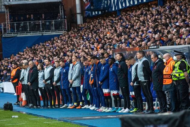 Mandatory Credit: Photo by Kirk O Rourke Rangers FC Shutterstock (12926021ge) Rangers players, management and fans during a moment silence for kitman Jimmy Bell during the Europa League Semi Final match against RB Leipzig at Ibrox Stadium, Glasgow. Rangers v RB Leipzig, UEFA Europa League, Semi Final, Second Leg, Football, Ibrox Stadium, Glasgow, UK - 05 May 2022 EDITORIAL USE ONLY No use with unauthorised audio, video, data, fixture lists, club league logos or live services. Online in-match use limited to 120 images, no video emulation. No use in betting, games or single club league player publications. Rangers v RB Leipzig, UEFA Europa League, Semi Final, Second Leg, Football, Ibrox Stadium, Glasgow, UK - 05 May 2022 EDITORIAL USE ONLY No use with unauthorised audio, video, data, fixture lists, club league logos or live services. Online in-match use limited to 120 images, no video emulation. No use in betting, games or single club league player publications. Copyright: xKirkxO Rourke RangersxFC Shutterstockx 12926021ge