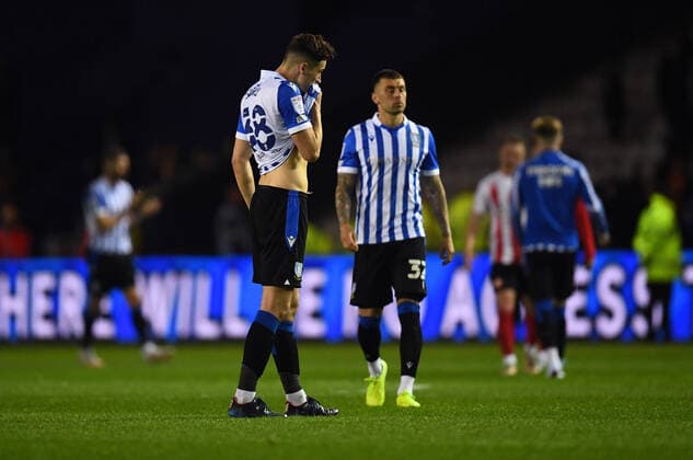 Mandatory Credit: Photo by Anna Gowthorpe Shutterstock (12931769af) Jordan Storey of Sheffield Wednesday is dejected at full time Sheffield Wednesday v Sunderland, EFL Sky Bet League One, Play-off Semi Final, Second Leg, Football, Hillsborough, Sheffield, UK - 09 May 2022 EDITORIAL USE ONLY No use with unauthorised audio, video, data, fixture lists, club league logos or live services. Online in-match use limited to 120 images, no video emulation. No use in betting, games or single club league player publications. Sheffield Wednesday v Sunderland, EFL Sky Bet League One, Play-off Semi Final, Second Leg, Football, Hillsborough, Sheffield, UK - 09 May 2022 EDITORIAL USE ONLY No use with unauthorised audio, video, data, fixture lists, club league logos or live services. Online in-match use limited to 120 images, no video emulation. No use in betting, games or single club league player publications. Copyright: xAnnaxGowthorpe Shutterstockx 12931769af