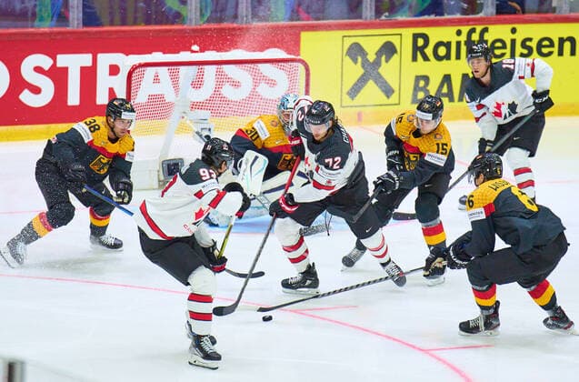 Kai Wissmann, Nr. 6 of Germany Fabio Wagner Nr.38 of Germany Stefan Loibl Nr.15 of Germany Philipp GRUBAUER Goalie Nr.30 of Germany compete, fight for the puck against, Thomas Chabot Nr. 72 of Canada Kent Johnson Nr. 93 of Canada in the match GERMANY - CANADA 3-5 IIHF Ice hockey, Eishockey World Championship, WM, Weltmeisterschaft Group B in Helsinki, Finland, May 13, 2022, Season 2021 2022