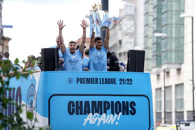 Mandatory Credit: Photo by Robbie Stephenson JMP Shutterstock (12953257l) Rodri and Joao Cancelo of Manchester City celebrate their Premier League title win during the open top bus parade Manchester City Champions Bus Parade, UK - 23 May 2022 EDITORIAL USE ONLY No use with unauthorised audio, video, data, fixture lists (outside the EU), club league logos or live services. Online in-match use limited to 45 images (+15 in extra time). No use to emulate moving images. No use in betting, games or single club league player publications services. Manchester City Champions Bus Parade, UK - 23 May 2022 EDITORIAL USE ONLY No use with unauthorised audio, video, data, fixture lists (outside the EU), club league logos or live services. Online in-match use limited to 45 images (+15 in extra time). No use to emulate moving images. No use in betting, games or Copyright: xRobbiexStephenson JMP Shutterstockx 12953257l