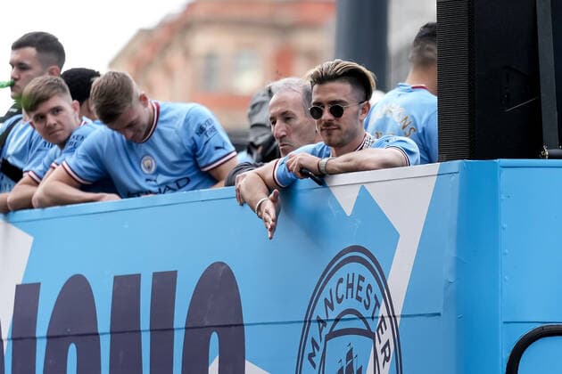 Mandatory Credit: Photo by Robbie Stephenson JMP Shutterstock (12953257s) Jack Grealish of Manchester City celebrates his side s Premier League title win during the open top bus parade Manchester City Champions Bus Parade, UK - 23 May 2022 EDITORIAL USE ONLY No use with unauthorised audio, video, data, fixture lists (outside the EU), club league logos or live services. Online in-match use limited to 45 images (+15 in extra time). No use to emulate moving images. No use in betting, games or single club league player publications services. Manchester City Champions Bus Parade, UK - 23 May 2022 EDITORIAL USE ONLY No use with unauthorised audio, video, data, fixture lists (outside the EU), club league logos or live services. Online in-match use limited to 45 images (+15 in extra time). No use to emulate moving images. No use in betting, games or Copyright: xRobbiexStephenson JMP Shutterstockx 12953257s