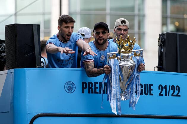 Mandatory Credit: Photo by Robbie Stephenson JMP Shutterstock (12953257u) Rodri, Kyle Walker and Ederson of Manchester City celebrate their Premier League title win during the open top bus parade Manchester City Champions Bus Parade, UK - 23 May 2022 EDITORIAL USE ONLY No use with unauthorised audio, video, data, fixture lists (outside the EU), club league logos or live services. Online in-match use limited to 45 images (+15 in extra time). No use to emulate moving images. No use in betting, games or single club league player publications services. Manchester City Champions Bus Parade, UK - 23 May 2022 EDITORIAL USE ONLY No use with unauthorised audio, video, data, fixture lists (outside the EU), club league logos or live services. Online in-match use limited to 45 images (+15 in extra time). No use to emulate moving images. No use in betting, games or Copyright: xRobbiexStephenson JMP Shutterstockx 12953257u