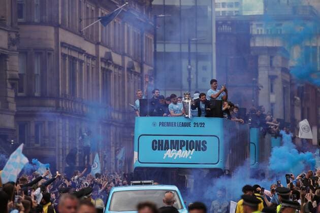 Mandatory Credit: Photo by Paul Greenwood Shutterstock (12952148m) A general view of the Manchester City trophy parade through Manchester City Centre to celebrate winning the Premier League Manchester City Trophy Parade, Premier League, Football, Manchester, UK - 23 May 2022 EDITORIAL USE ONLY No use with unauthorised audio, video, data, fixture lists, club league logos or live services. Online in-match use limited to 120 images, no video emulation. No use in betting, games or single club league player publications. Manchester City Trophy Parade, Premier League, Football, Manchester, UK - 23 May 2022 EDITORIAL USE ONLY No use with unauthorised audio, video, data, fixture lists, club league logos or live services. Online in-match use limited to 120 images, no video emulation. No use in betting, games or single club league player publications. Copyright: xPaulxGreenwood Shutterstockx 12952148m