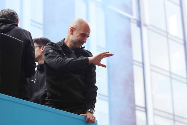 Mandatory Credit: Photo by Paul Greenwood Shutterstock (12952148n) Manchester City manager Josep Guardiola during the bus parade through Manchester City centre to celebrate winning thr Premier League Manchester City Trophy Parade, Premier League, Football, Manchester, UK - 23 May 2022 EDITORIAL USE ONLY No use with unauthorised audio, video, data, fixture lists, club league logos or live services. Online in-match use limited to 120 images, no video emulation. No use in betting, games or single club league player publications. Manchester City Trophy Parade, Premier League, Football, Manchester, UK - 23 May 2022 EDITORIAL USE ONLY No use with unauthorised audio, video, data, fixture lists, club league logos or live services. Online in-match use limited to 120 images, no video emulation. No use in betting, games or single club league player publications. Copyright: xPaulxGreenwood Shutterstockx 12952148n