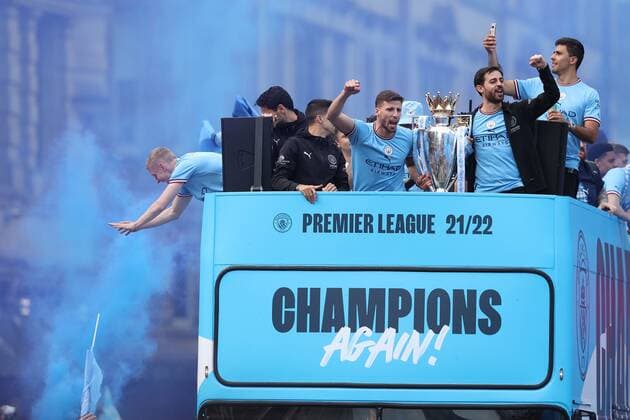 Mandatory Credit: Photo by Paul Greenwood Shutterstock (12952148r) Manchester City players Joao Cancelo, Ruben Dias, Bernardo Silva, and Rodri with the Premier League trophy during the bus parade through Manchester City centre to celebrate winning the Premier League Manchester City Trophy Parade, Premier League, Football, Manchester, UK - 23 May 2022 EDITORIAL USE ONLY No use with unauthorised audio, video, data, fixture lists, club league logos or live services. Online in-match use limited to 120 images, no video emulation. No use in betting, games or single club league player publications. Manchester City Trophy Parade, Premier League, Football, Manchester, UK - 23 May 2022 EDITORIAL USE ONLY No use with unauthorised audio, video, data, fixture lists, club league logos or live services. Online in-match use limited to 120 images, no video emulation. No use in betting, games or single club league player publications. Copyright: xPaulxGreenwood Shutterstockx 12952148r