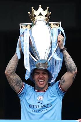 Mandatory Credit: Photo by Paul Greenwood Shutterstock (12952148aa) Ederson of Manchester City and the Premier League trophy during the bus parade through Manchester City centre to celebrate winning the Premier League Manchester City Trophy Parade, Premier League, Football, Manchester, UK - 23 May 2022 EDITORIAL USE ONLY No use with unauthorised audio, video, data, fixture lists, club league logos or live services. Online in-match use limited to 120 images, no video emulation. No use in betting, games or single club league player publications. Manchester City Trophy Parade, Premier League, Football, Manchester, UK - 23 May 2022 EDITORIAL USE ONLY No use with unauthorised audio, video, data, fixture lists, club league logos or live services. Online in-match use limited to 120 images, no video emulation. No use in betting, games or single club league player publications. Copyright: xPaulxGreenwood Shutterstockx 12952148aa