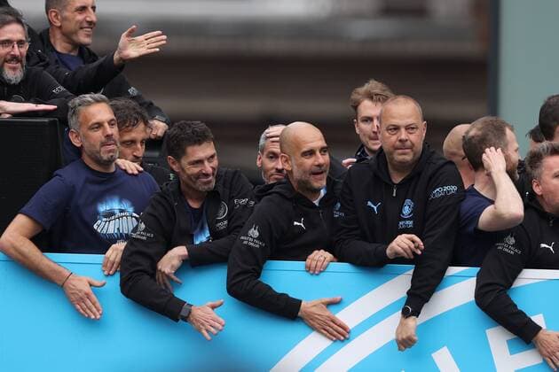 Mandatory Credit: Photo by Paul Greenwood Shutterstock (12952148z) Manchester City manager Josep Guardiola during the bus parade through Manchester City centre to celebrate winning the Premier League Manchester City Trophy Parade, Premier League, Football, Manchester, UK - 23 May 2022 EDITORIAL USE ONLY No use with unauthorised audio, video, data, fixture lists, club league logos or live services. Online in-match use limited to 120 images, no video emulation. No use in betting, games or single club league player publications. Manchester City Trophy Parade, Premier League, Football, Manchester, UK - 23 May 2022 EDITORIAL USE ONLY No use with unauthorised audio, video, data, fixture lists, club league logos or live services. Online in-match use limited to 120 images, no video emulation. No use in betting, games or single club league player publications. Copyright: xPaulxGreenwood Shutterstockx 12952148z