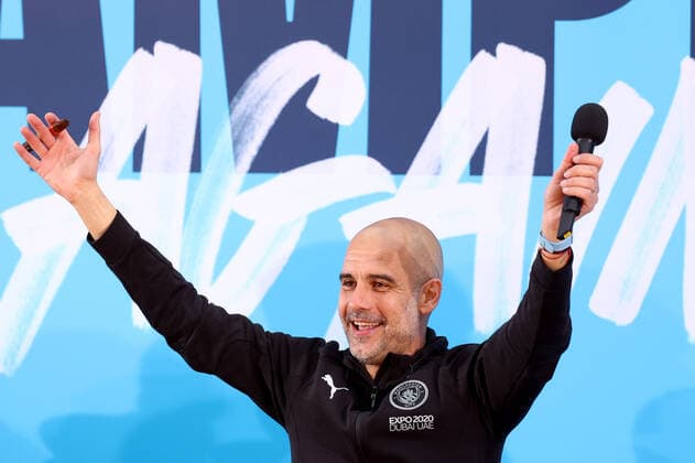 Mandatory Credit: Photo by Paul Greenwood Shutterstock (12952148ci) Manchester City manager Josep Guardiola during the Premier League trophy celebrations in Manchester City centre to celebrate winning the Premier League Manchester City Trophy Parade, Premier League, Football, Manchester, UK - 23 May 2022 EDITORIAL USE ONLY No use with unauthorised audio, video, data, fixture lists, club league logos or live services. Online in-match use limited to 120 images, no video emulation. No use in betting, games or single club league player publications. Manchester City Trophy Parade, Premier League, Football, Manchester, UK - 23 May 2022 EDITORIAL USE ONLY No use with unauthorised audio, video, data, fixture lists, club league logos or live services. Online in-match use limited to 120 images, no video emulation. No use in betting, games or single club league player publications. Copyright: xPaulxGreenwood Shutterstockx 12952148ci