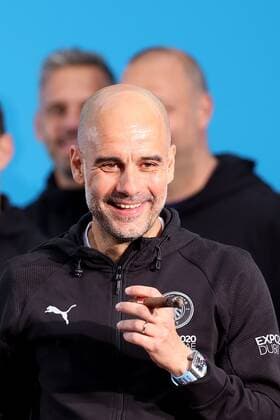 Mandatory Credit: Photo by Paul Greenwood Shutterstock (12952148cj) Manchester City manager Josep Guardiola during the Premier League trophy celebrations in Manchester City centre to celebrate winning the Premier League Manchester City Trophy Parade, Premier League, Football, Manchester, UK - 23 May 2022 EDITORIAL USE ONLY No use with unauthorised audio, video, data, fixture lists, club league logos or live services. Online in-match use limited to 120 images, no video emulation. No use in betting, games or single club league player publications. Manchester City Trophy Parade, Premier League, Football, Manchester, UK - 23 May 2022 EDITORIAL USE ONLY No use with unauthorised audio, video, data, fixture lists, club league logos or live services. Online in-match use limited to 120 images, no video emulation. No use in betting, games or single club league player publications. Copyright: xPaulxGreenwood Shutterstockx 12952148cj