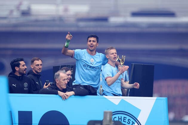 Mandatory Credit: Photo by Paul Greenwood Shutterstock (12952148de) Rodri and Oleksandr Zinchenko of Manchester City and the Premier League trophy during the bus parade through Manchester City centre to celebrate winning thr Premier League Manchester City Trophy Parade, Premier League, Football, Manchester, UK - 23 May 2022 EDITORIAL USE ONLY No use with unauthorised audio, video, data, fixture lists, club league logos or live services. Online in-match use limited to 120 images, no video emulation. No use in betting, games or single club league player publications. Manchester City Trophy Parade, Premier League, Football, Manchester, UK - 23 May 2022 EDITORIAL USE ONLY No use with unauthorised audio, video, data, fixture lists, club league logos or live services. Online in-match use limited to 120 images, no video emulation. No use in betting, games or single club league player publications. Copyright: xPaulxGreenwood Shutterstockx 12952148de