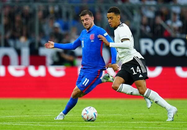 Mandatory Credit: Photo by Javier Garcia Shutterstock (12975315k) Mason Mount of England battles with Jamal Musiala of Germany Germany v England, UEFA Nations League, Group C, International Football, Allianz Arena, Munich, Germany - 07 Jun 2022 EDITORIAL USE ONLY No use with unauthorised audio, video, data, fixture lists, club league logos or live services. Online in-match use limited to 120 images, no video emulation. No use in betting, games or single club league player publications. Germany v England, UEFA Nations League, Group C, International Football, Allianz Arena, Munich, Germany - 07 Jun 2022 EDITORIAL USE ONLY No use with unauthorised audio, video, data, fixture lists, club league logos or live services. Online in-match use limited to 120 images, no video emulation. No use in betting, games or single club league player publications. Copyright: xJavierxGarcia Shutterstockx 12975315k